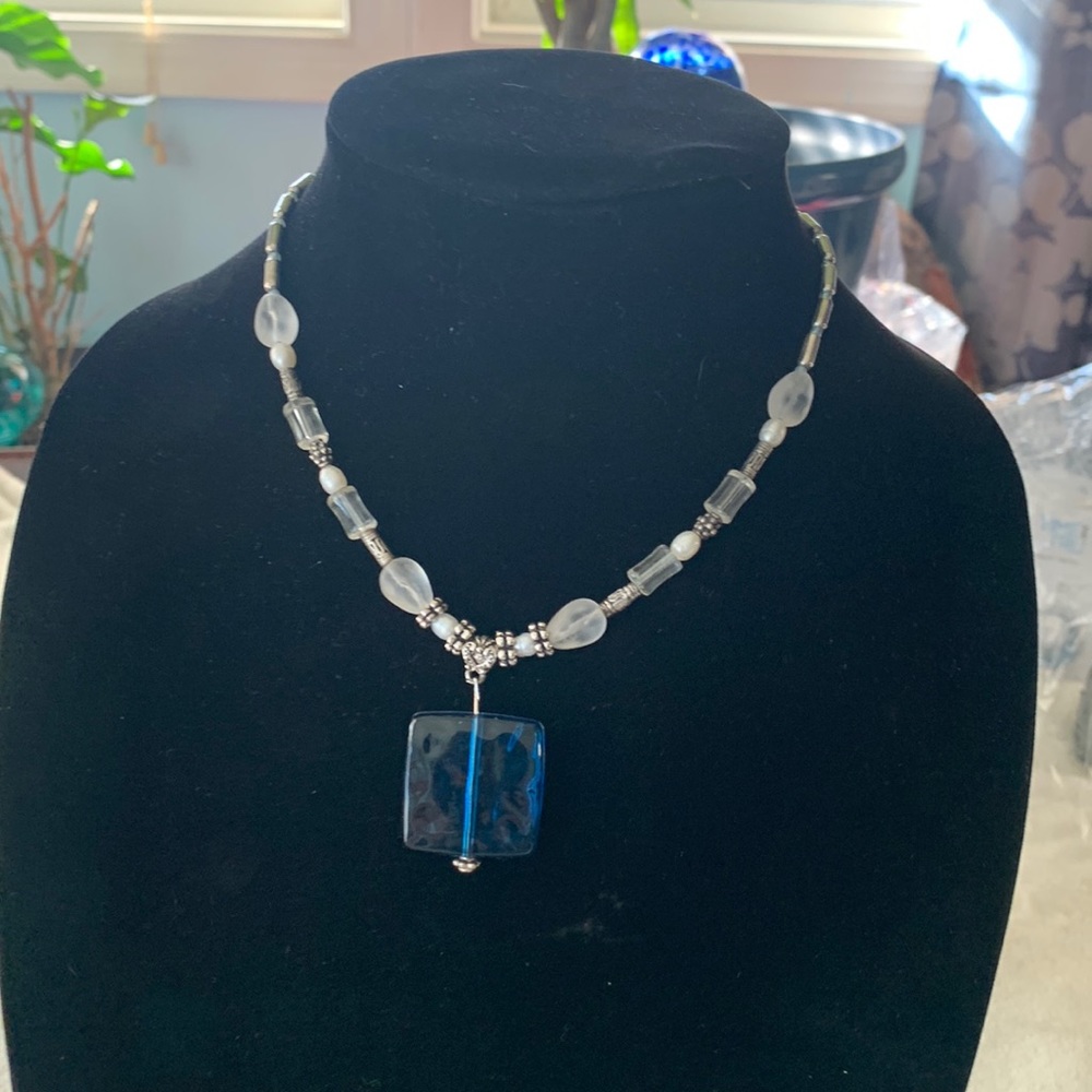 Silver, clear, and navy beaded necklace